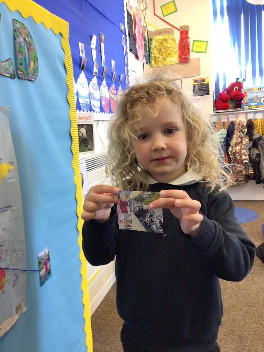 ypd_aidancampus's tweet photo. We all talked about the different places we have been on holiday and how we got there. Then we used our special photo or picture and string to  Show where we went on the world map! #SizzlingSummer 😎🍦☀️ 
#teamypdva🖤💛 @Penrhyndewi https://t.co/qLh88TgibH