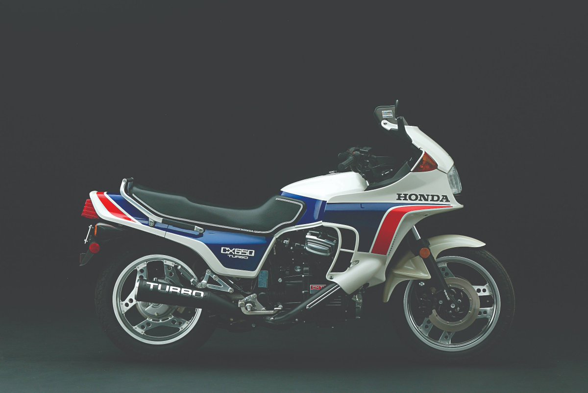 HondaPowersprts's tweet photo. #HondaHeritage The 1983 CX650T is an icon of its time--a two-wheeled embodiment of the early '80s and Honda’s strongest weapon in the metaphorical arms race amongst motorcycle manufacturers to produce faster, lighter, more powerful forced-induction rides during this time period. https://t.co/OnbDLgrxQw