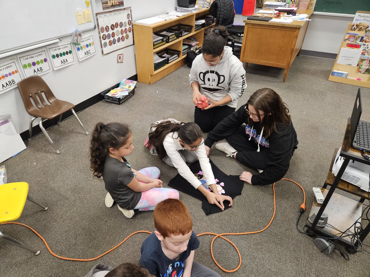HJLassaline's tweet photo. Miss Valente's grade 5/6 class worked with Mrs. Stancek's grade 1/2 students and taught them how to make reusable bags out of old t-shirts.
#earthday2023
#developmentandpeace https://t.co/7LUblkvjGa