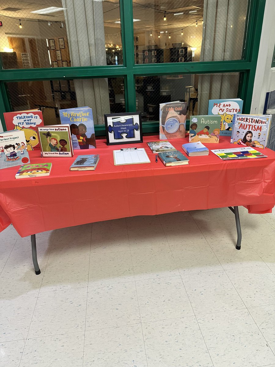 Destined2BeSPED's tweet photo. Got our teacher library checkout area for Autism Awareness week set up! https://t.co/C31IqILa66