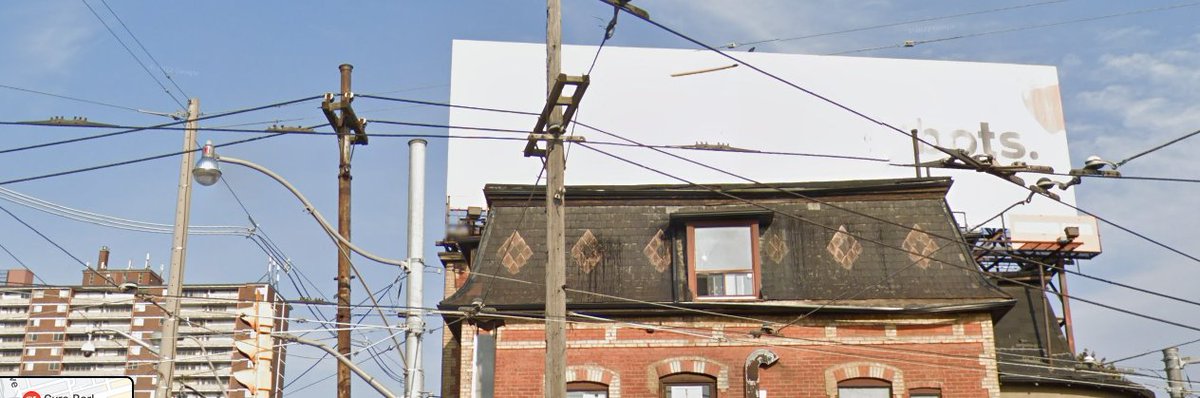 themikeyzone's tweet photo. @AmoneyResists Can confirm location of billboard itself is in Toronto (King/Queen St intersection) see google streetview.  But can't confirm what is on the billboard currently. https://t.co/fTbo7KoUUk