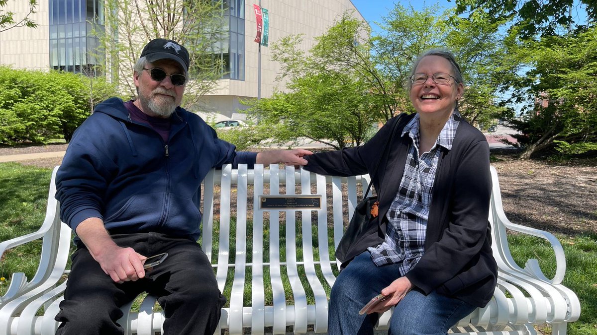 Mizzou's tweet photo. A large crowd gathered in Peace Park this afternoon to dedicate a white bench in memory of Harlan, the beloved Great Pyrenees. 

President Choi attended the dedication and thanked Harlan’s owners for sharing him with the #Mizzou community. 🖤💛

Read: https://t.co/VfKCW0SwKn https://t.co/lJ2aIH1Pb1