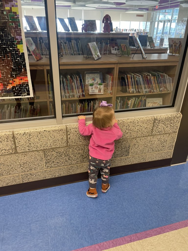 MrsTarynBrinlee's tweet photo. Mills came to @CRE_Cardinals this morning and kept running back to the library and looking for her friend @MattVillasana. She loved all the book displays and took a special liking to the Rosie poster. Raising her right! #CREateLeaders #CREateReaders https://t.co/nlPtusOdMr