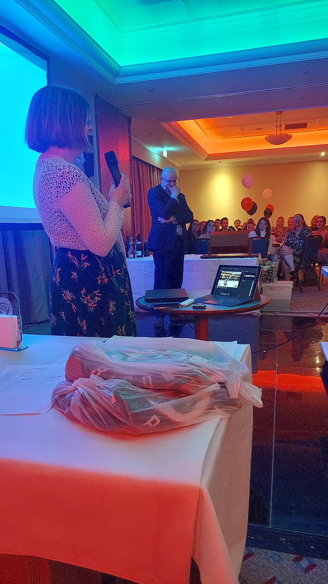 BisonIceHockey's tweet photo. He couldn't stop the surprise. Carol takes the mic to give John Neville the "Heart of the Bison" award and the standing ovation that all his efforts for this club deserve. https://t.co/kyHh86aTZ2