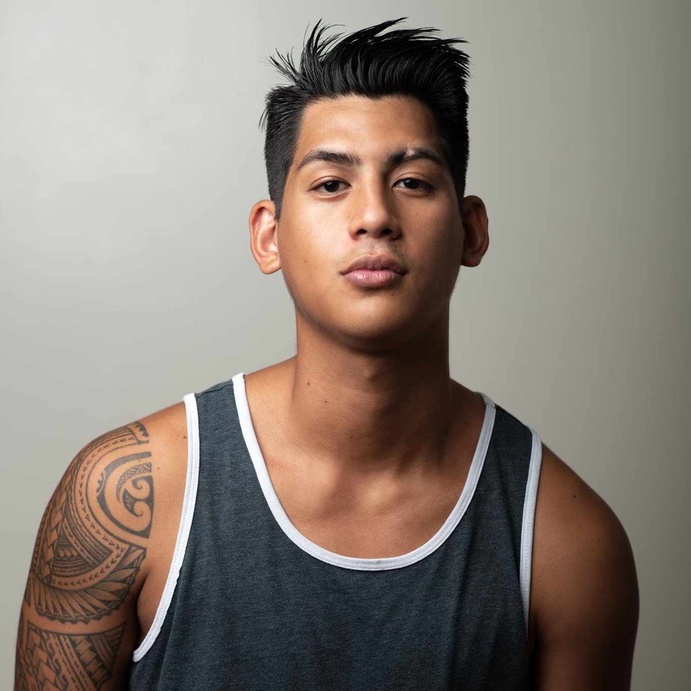 An aerial view of waves crashing against a shore.