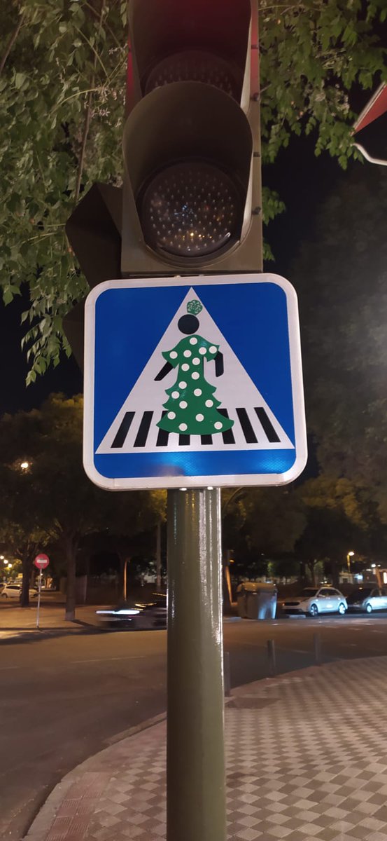 LucioVillegas's tweet photo. El Bansky de la Feria lo ha vuelto a hacer. Qué maravilla!! La flamenca, el Rey cajonero, los claveles grana... https://t.co/bxeAnEDFCD