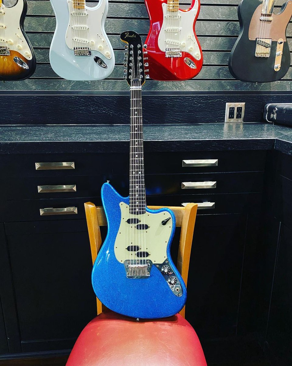 Fender's tweet photo. It’s officially festival season and we can’t think of a more perfect way to celebrate than this rad 12 string by Dennis Galuszka. What song are you playing on this one? https://t.co/cqoVDbfrDs
