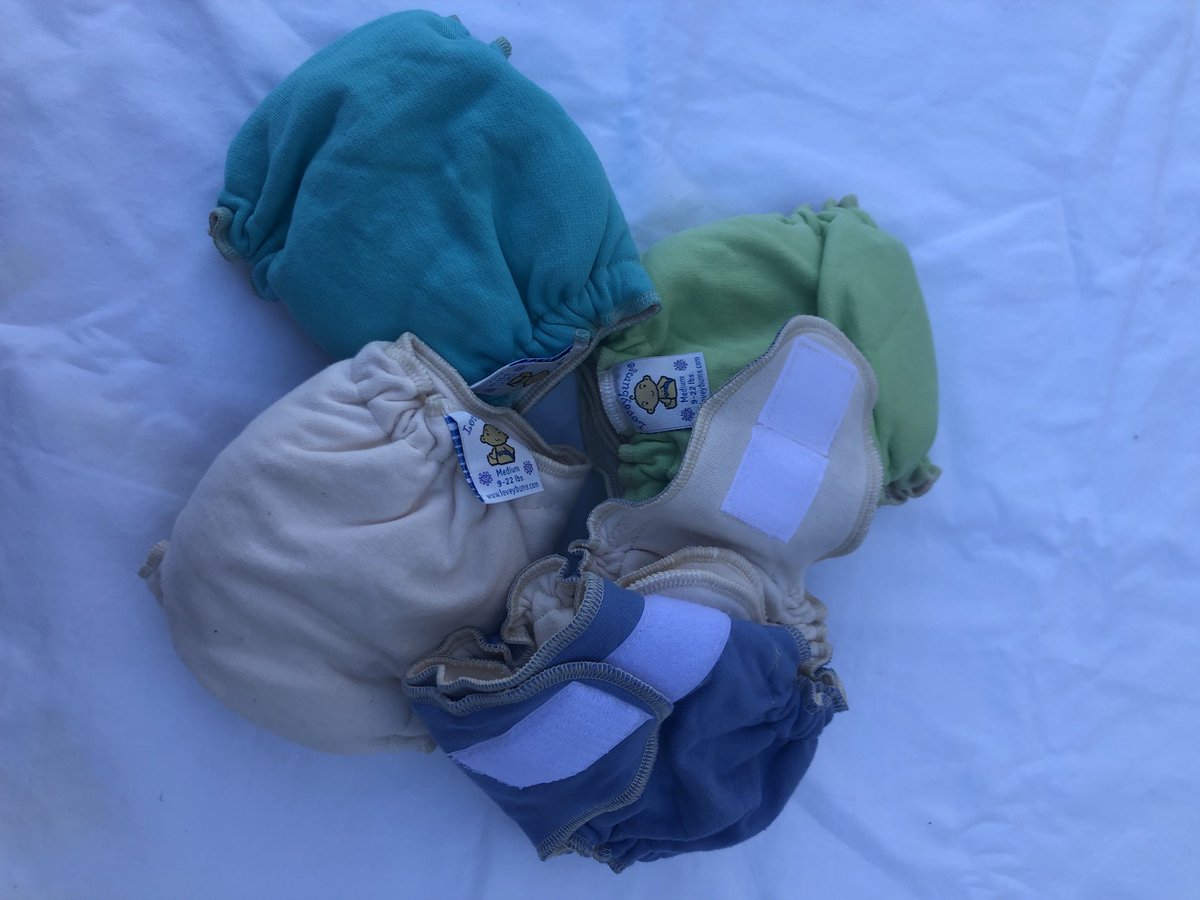 Loveybums 4pack diapers in multicolors .