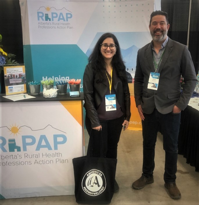 AlbertaRhPAP's tweet image. @UCalgaryMed student Shima Afhami stands along side RhPAP Board Chair Dr. Gavin Parker at the RhPAP booth during #SRPC2023. Don&apos;t for get to stop by and say hello if you are in attendance!