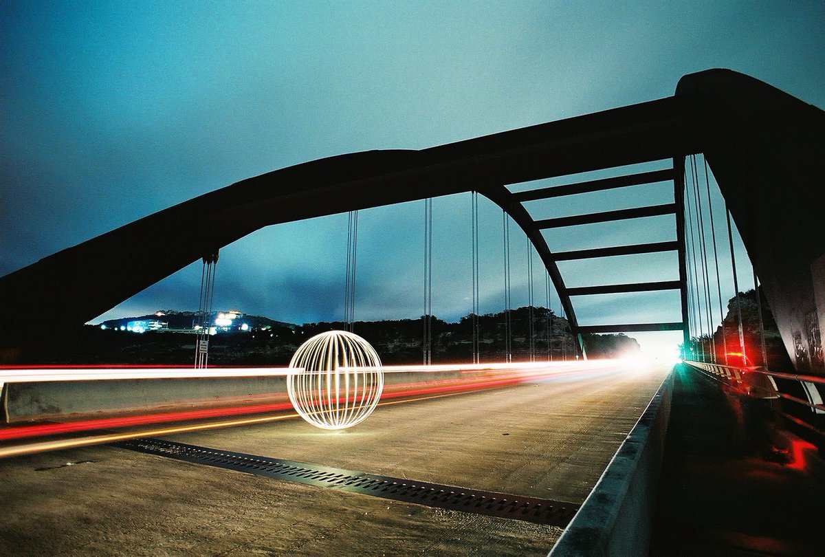 Sumerianduh's tweet photo. Its not fun if its not dangerous #lightpainting #lightart #longexposure #austin #texas #night #film #35mm #360bridge #pennybackerbridge https://t.co/zesgGMp7xq