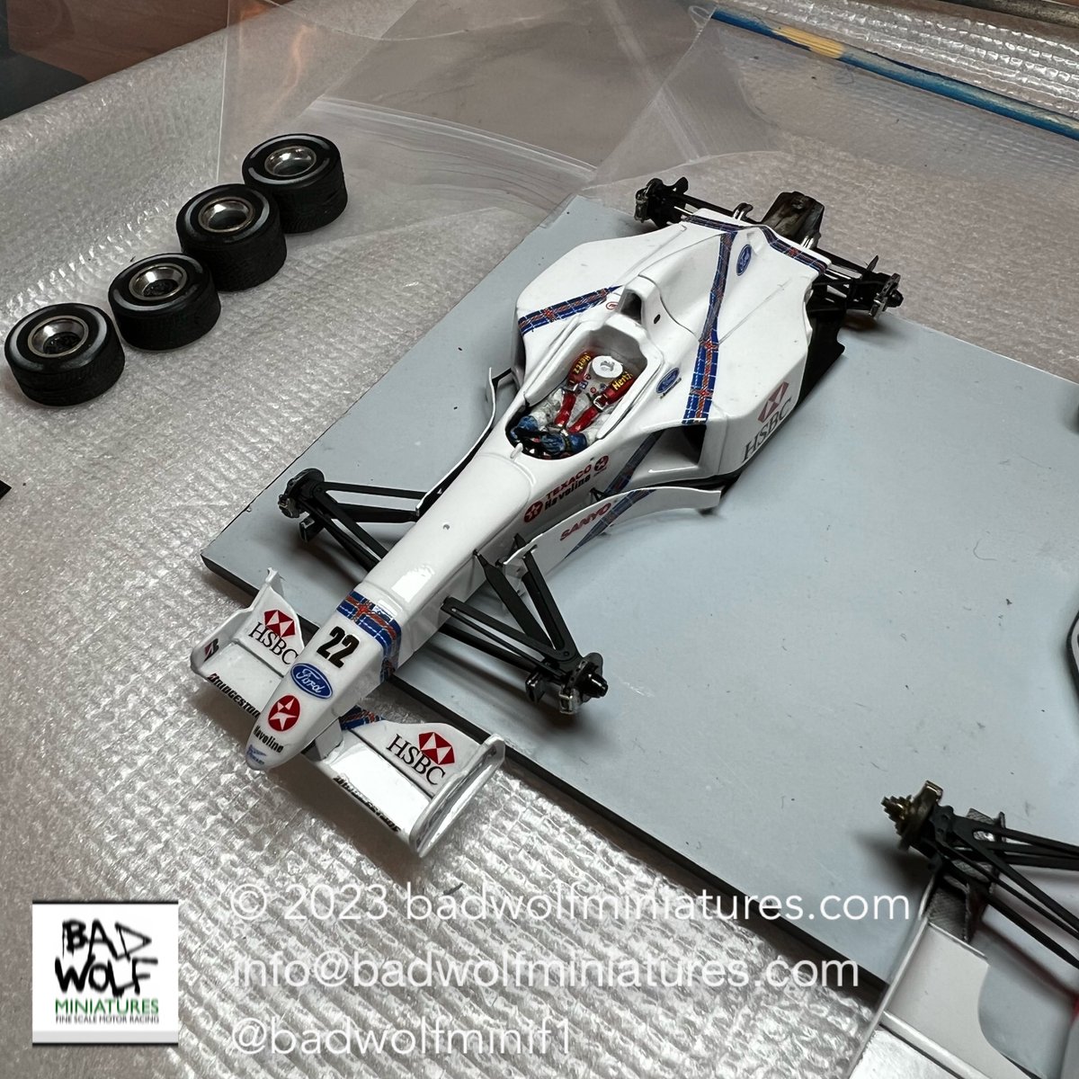 badwolfminif1's tweet photo. Barge-boards, front wing and front suspension now successfully added 👍🏻 Now to carefully add some carbon fibre decals to the rear wing #f1 #f1models #formula1 #diorama #tameo #stewart #barrichello #monaco #montecarlo https://t.co/iFLW6SouTq