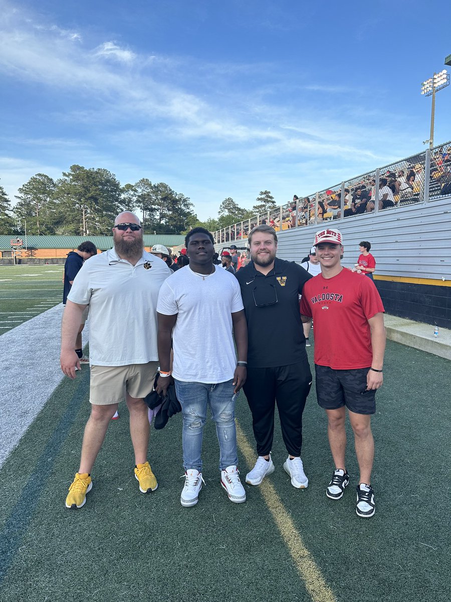 DanBlackbourn's tweet photo. Coach Gowan and Coach Black out at the Valdosta St Spring game with “Smoke” Bennett and Jalen Burgess (not pictured).  @24VHSFootball legend Wes Veal stopped by to visit as well!  #DATE https://t.co/aY8At75N4t
