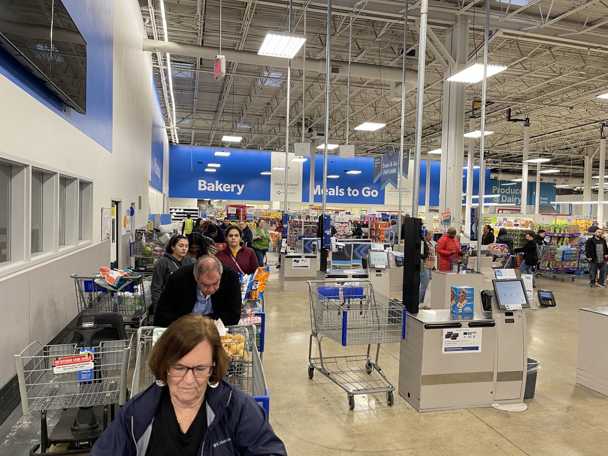 The line to exit @SamsClub is lined up past the cafe to the Pharmacy #Insane #Southgate #Michigan