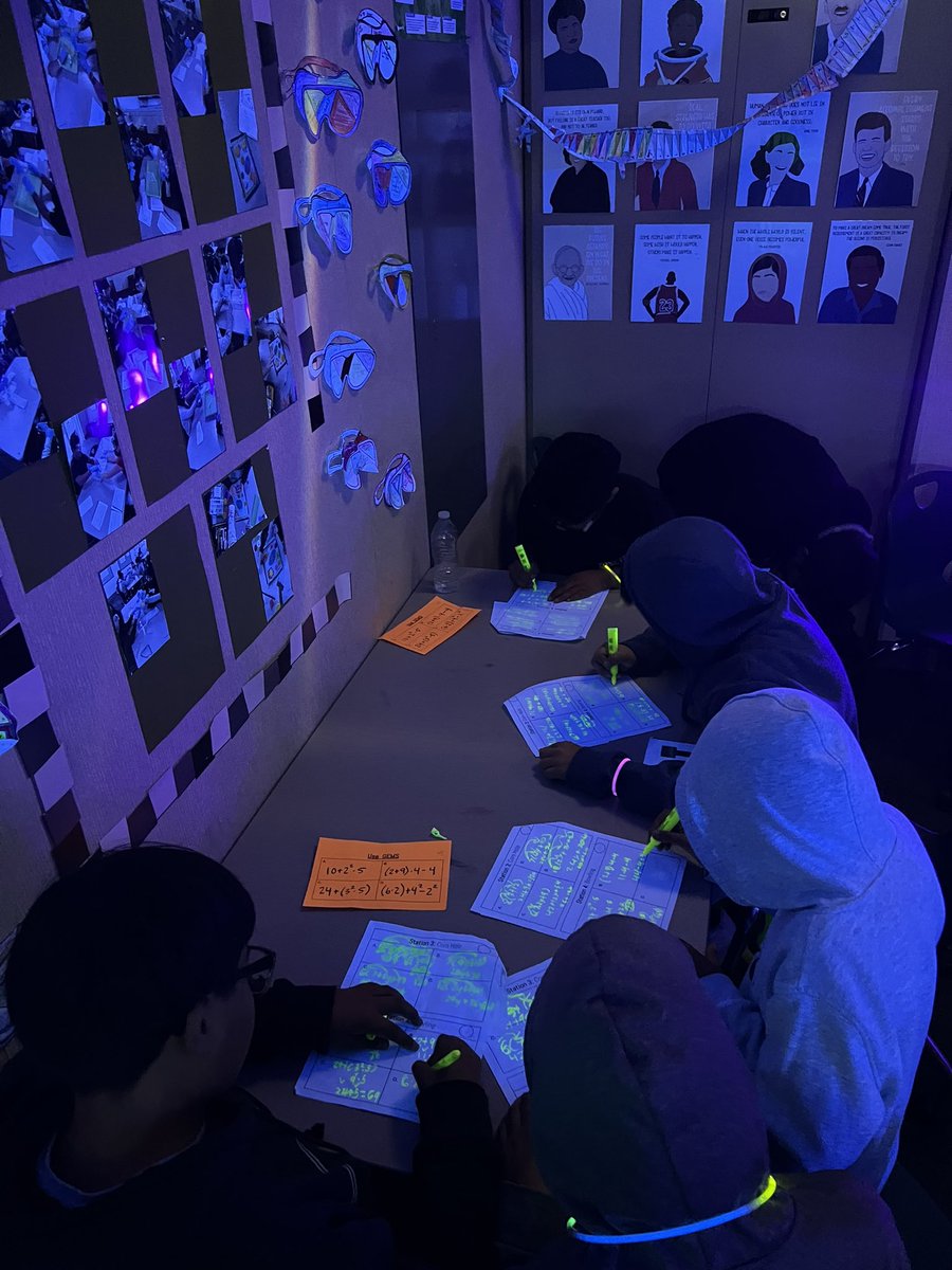 EAHallMS's tweet photo. Students in Mr. Palmerin's class had a Glow Math Review Day today!! Students reviewed different math topics they learned this year in the dark! They had a great time reviewing and practicing their math skills while having FUN! https://t.co/jUGgZm1grz