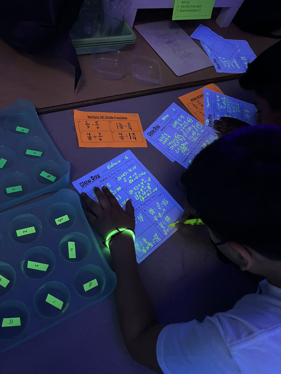 EAHallMS's tweet photo. Students in Mr. Palmerin's class had a Glow Math Review Day today!! Students reviewed different math topics they learned this year in the dark! They had a great time reviewing and practicing their math skills while having FUN! https://t.co/jUGgZm1grz