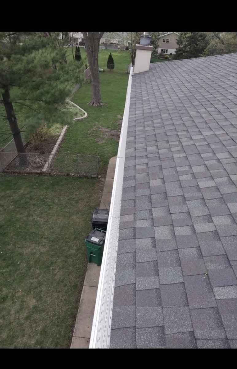 A quality #roofreplacement just isn't complete without quality #gutters! Here is an #OdysseyRoofing roofing project in #BloomingdaleIL with #CertainTeed #Landmark Driftwood #shingles complete with new #gutterguards!