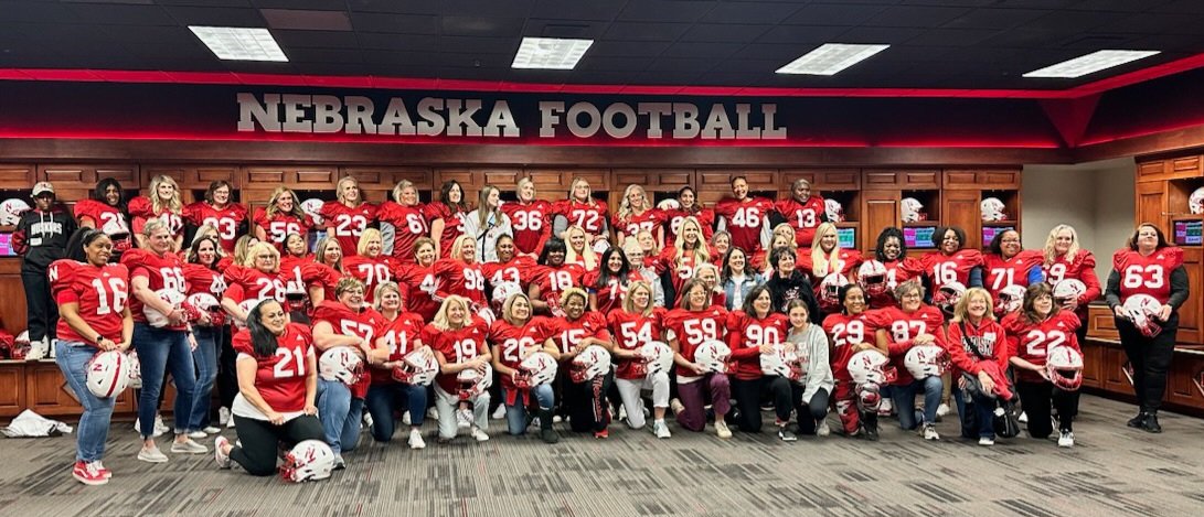 laurahutmacher's tweet photo. Great day at the Huskers "Tackle Your Son" event.  Thanks for the fun @HuskerFBNation @CoachMattRhule @ThePolarBear605 @joe_hutmacher
#momsrhuletheworld https://t.co/FfWrQmEfk6