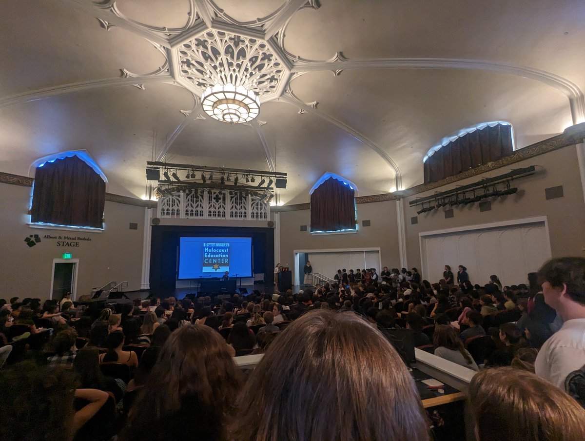 weareocsa's tweet photo. To commemorate the Jewish holiday Yom HaShoah, Holocaust Remembrance
Day, the Jewish Student Union hosted a presentation with Holocaust survivor Eva Schneider. Students filled Symphony Hall to hear this important conversation. https://t.co/55aMzFBe7i