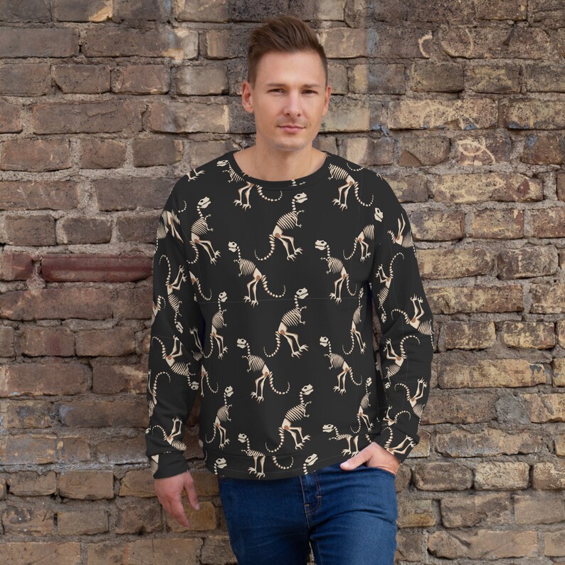 pixelpal_my's tweet photo. "Stay cozy and stylish with our new Dinosaur fossil bone all over print Unisex Sweatshirt! 🦕🦖 Get yours now on #Etsy: https://t.co/LhSd8erEP6 #dinosaur #alloverprint #streetwear #polyester #giftidea #cuteandcomfy #fossilsweatshirt #birthdaygift #winterfashion" https://t.co/IwTVUnecTQ