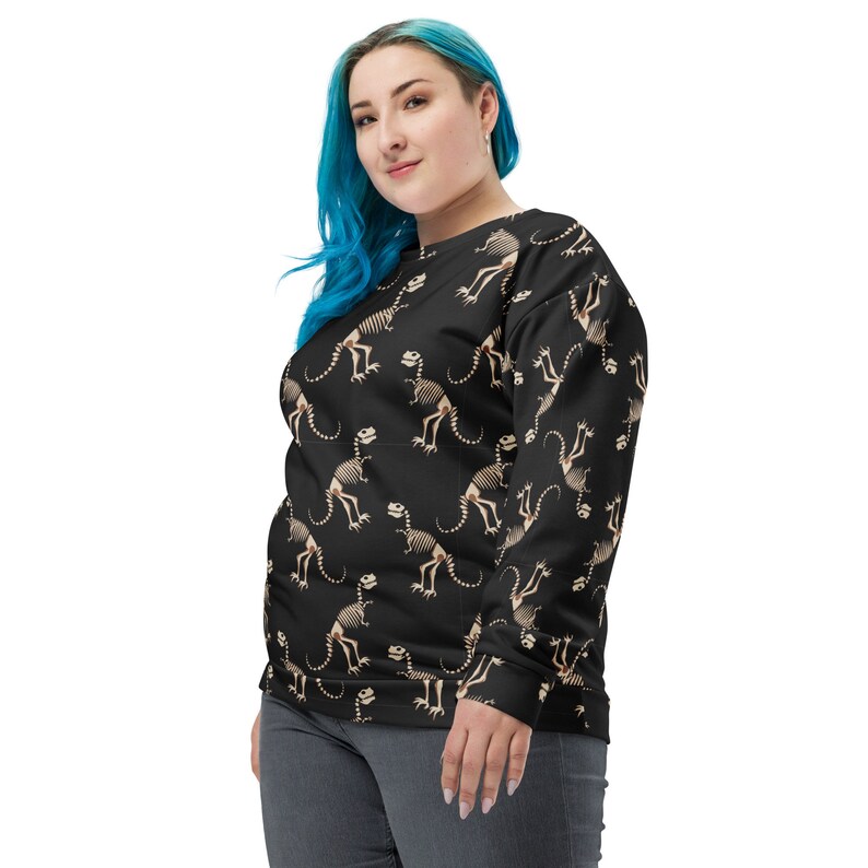 pixelpal_my's tweet photo. "Stay cozy and stylish with our new Dinosaur fossil bone all over print Unisex Sweatshirt! 🦕🦖 Get yours now on #Etsy: https://t.co/LhSd8erEP6 #dinosaur #alloverprint #streetwear #polyester #giftidea #cuteandcomfy #fossilsweatshirt #birthdaygift #winterfashion" https://t.co/IwTVUnecTQ