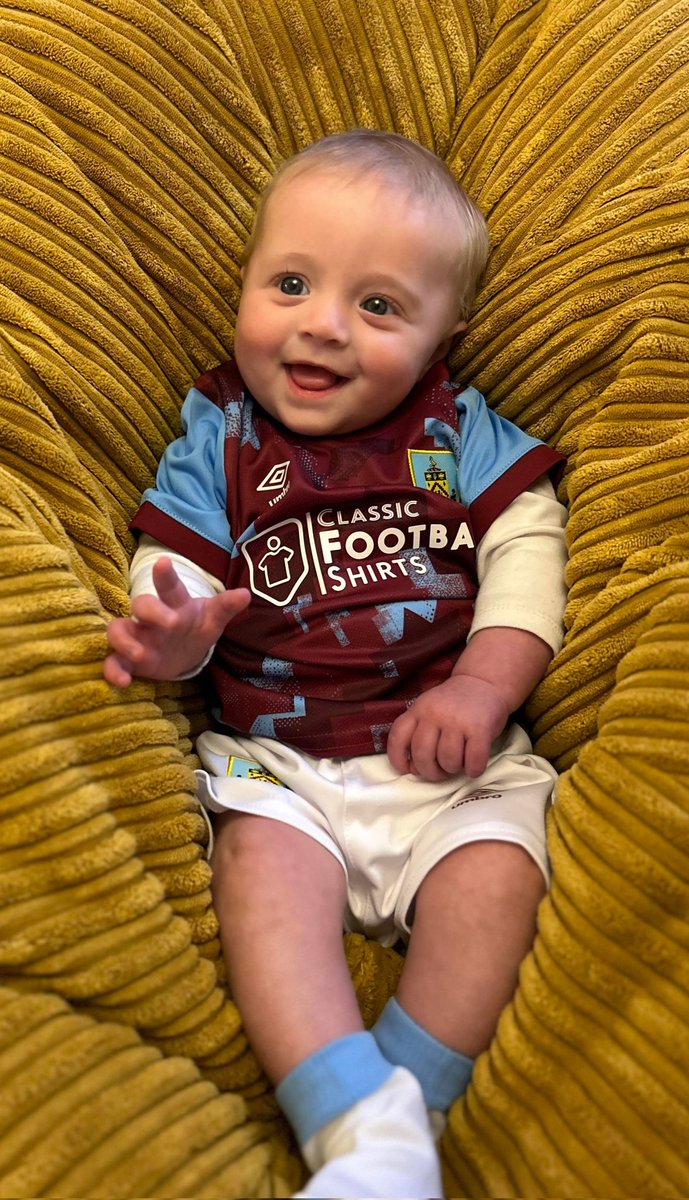 emmacglambert's tweet photo. Too little to be on the Turf yet, but 5 month old Henry is already a true claret! Mummy &amp; Grandpa will be cheering on the boys as we bring the title home today! #UTC #twitterclarets #wearepremierleague @BurnleyOfficial https://t.co/AWe8imj2cI