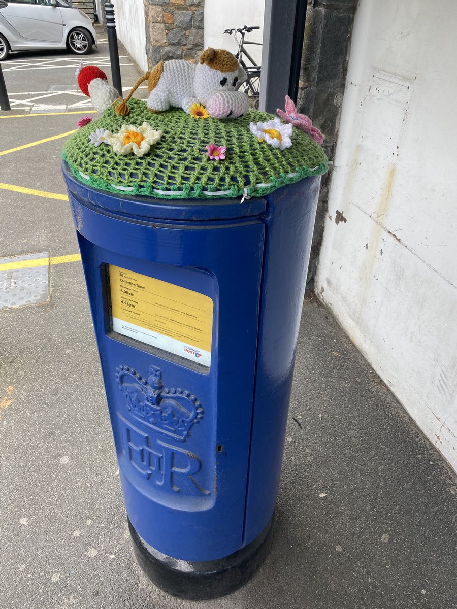 #postboxsaturday I’ve photographed this one before but it’s got a new topper!! My daughter commented that the cow has a very big nose - how personal!! 😂😂 #guernsey