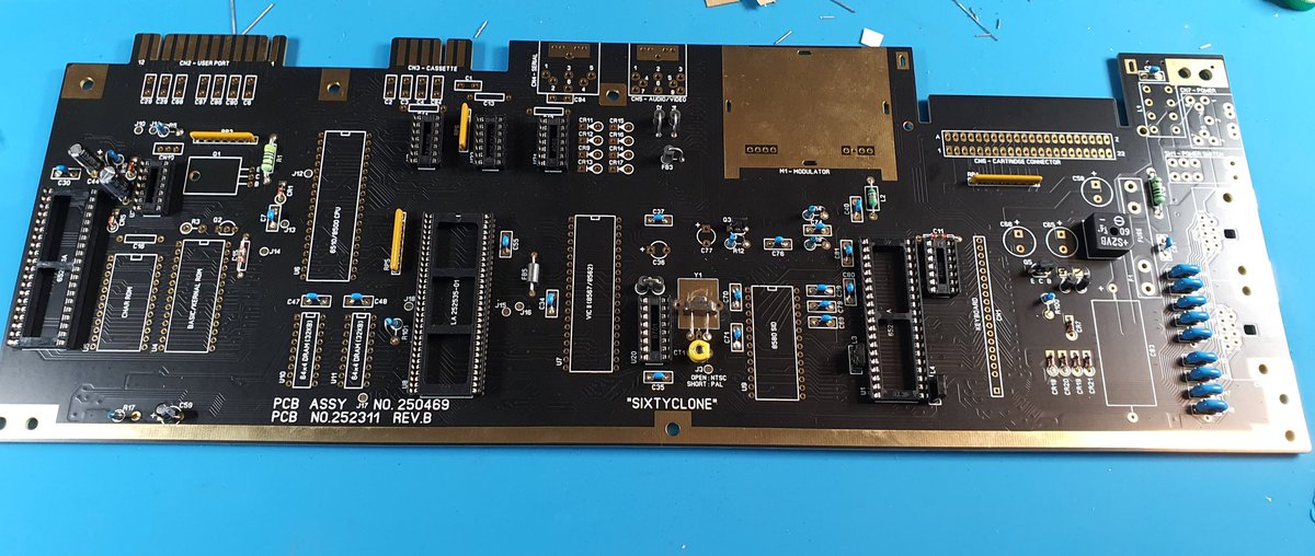 RetroWizzard's tweet photo. Made some good progress on the #SixtyClone yesterday.
It's actually starting to look like a #C64 mainboard.🙂
Still missing the electrolytes, but I want to wait for the low profile zifs to arrive.
#RetroComputing #retrogaming https://t.co/qgpGlouIiu
