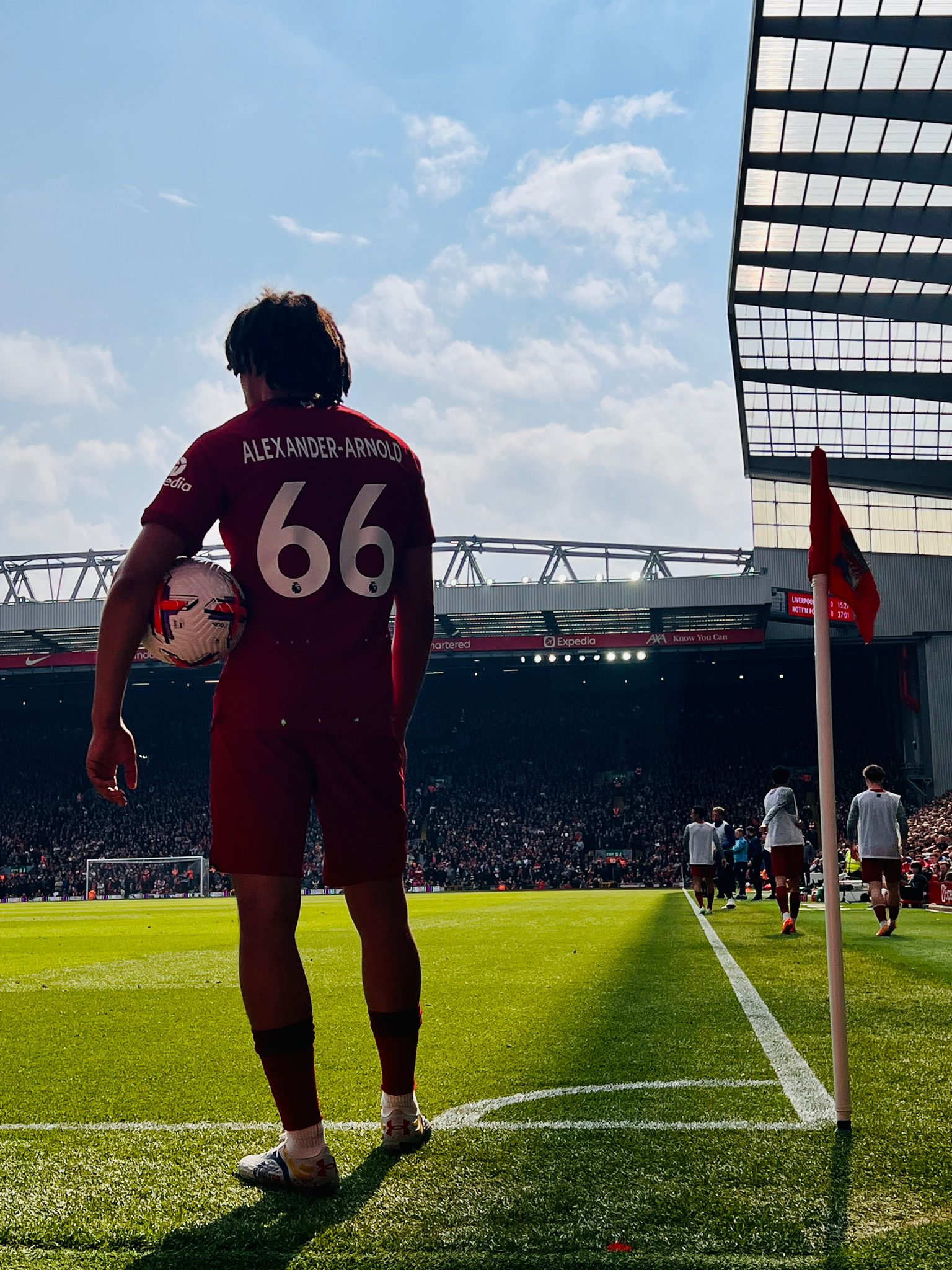 Trent Alexander-Arnold waiting to take a corner at the Anfield Road end against Nottingham Forest.