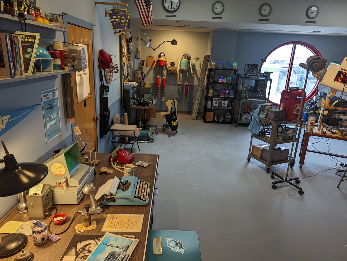 Trainplane3's tweet photo. Still love the Robot Repair shop @PITairport by @tobyfraley . Any way I could buy a poster of that autopilot repair ad? https://t.co/ZQ35qVknrY