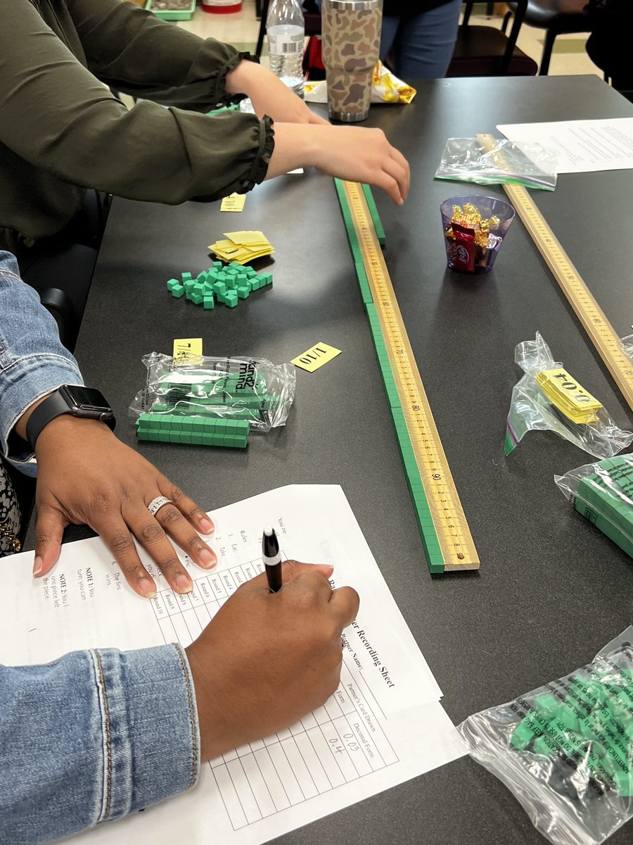 Playing Race to a Meter - connecting concrete models to abstract representation (adding decimals). #NCCTMeast