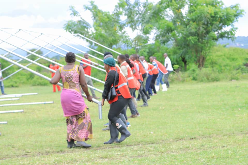 UgandaRedCross's tweet photo. “We’re the first National Society in Africa to adopt the emergency shelter as a mechanism of responding to disasters. These temporary shelters can each host up to 200 people. We do this during emergencies.“ @DrBrianBilalK - URCS Director Disaster Risk Management https://t.co/MdbeybOoDb
