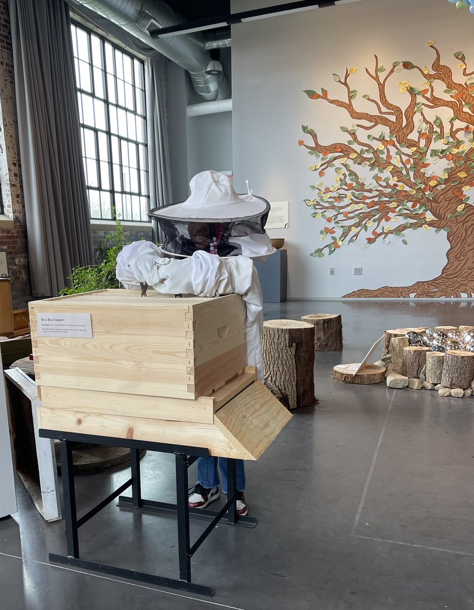 Young beekeeper at work at #GatherFarm during #EarthDay