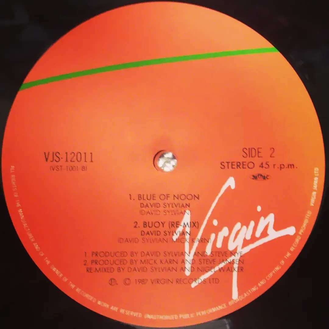 Now playing David Sylvian's Single 'Let the Happiness In' c/w 'Blue of Moon' & 'Buoy', 12inch single edition. #davidsylvian #ryuichisakamoto #stevejansen #mickkarn #vinyl