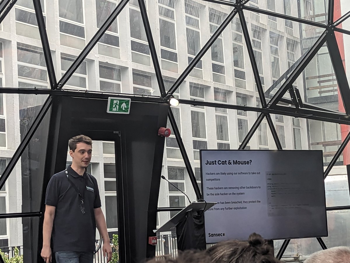 the6by6's tweet photo. @daniel_sloof discusses how ecomm hackers use @sansecio tools to clean up other hackers exploits to stay top _mice_ / exploiters on the stores. #MagetitansMCR https://t.co/x4iEoMXVgk