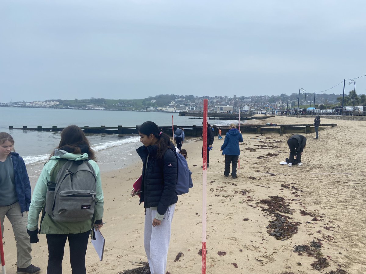 Trying to keep warm, and measure beach profile all at the same time! @WimbledonHigh #year10whs #tripswhs
