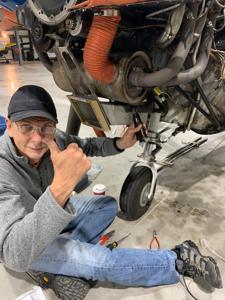 Crispyrat's tweet photo. Weather is terrible but this is the happy face of someone who just got the lock-wire on the carb to airbox joint approved by inspecting AME’s on the first try. (We don’t talk about how long that first try took and the associated vocabulary). #PilotProblems https://t.co/9LRGfMcZdw