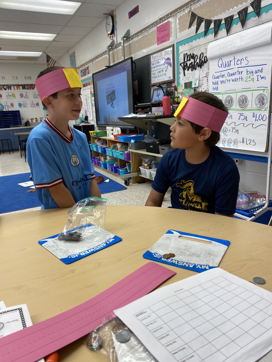 MeganTereshko's tweet photo. Second graders used headbands to turn up the fun while learning to count money amounts💰 @bozinale @mathRES_SES https://t.co/TYcrbtmYdx