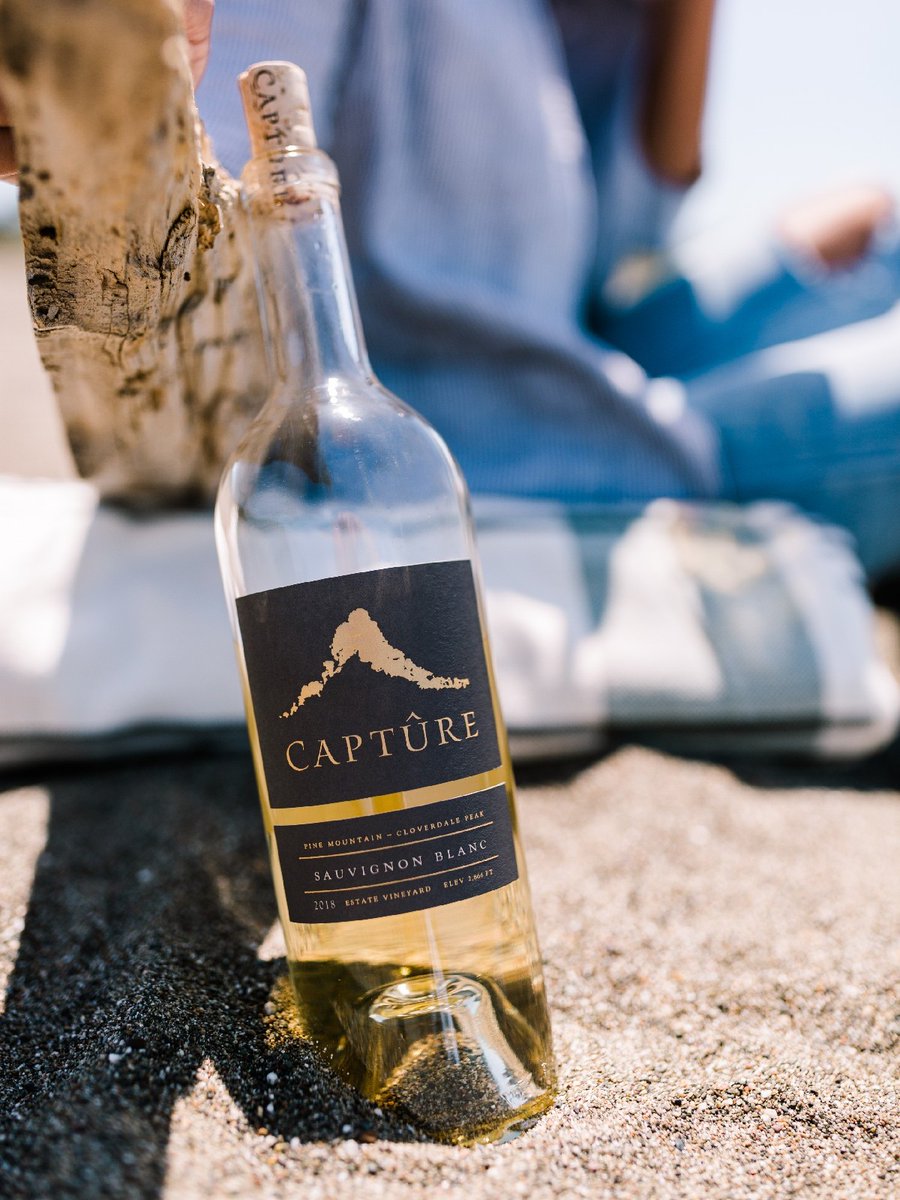 We can't think of a better way to spend the weekend than with sand in our toes and Sauvignon Blanc in our glass.