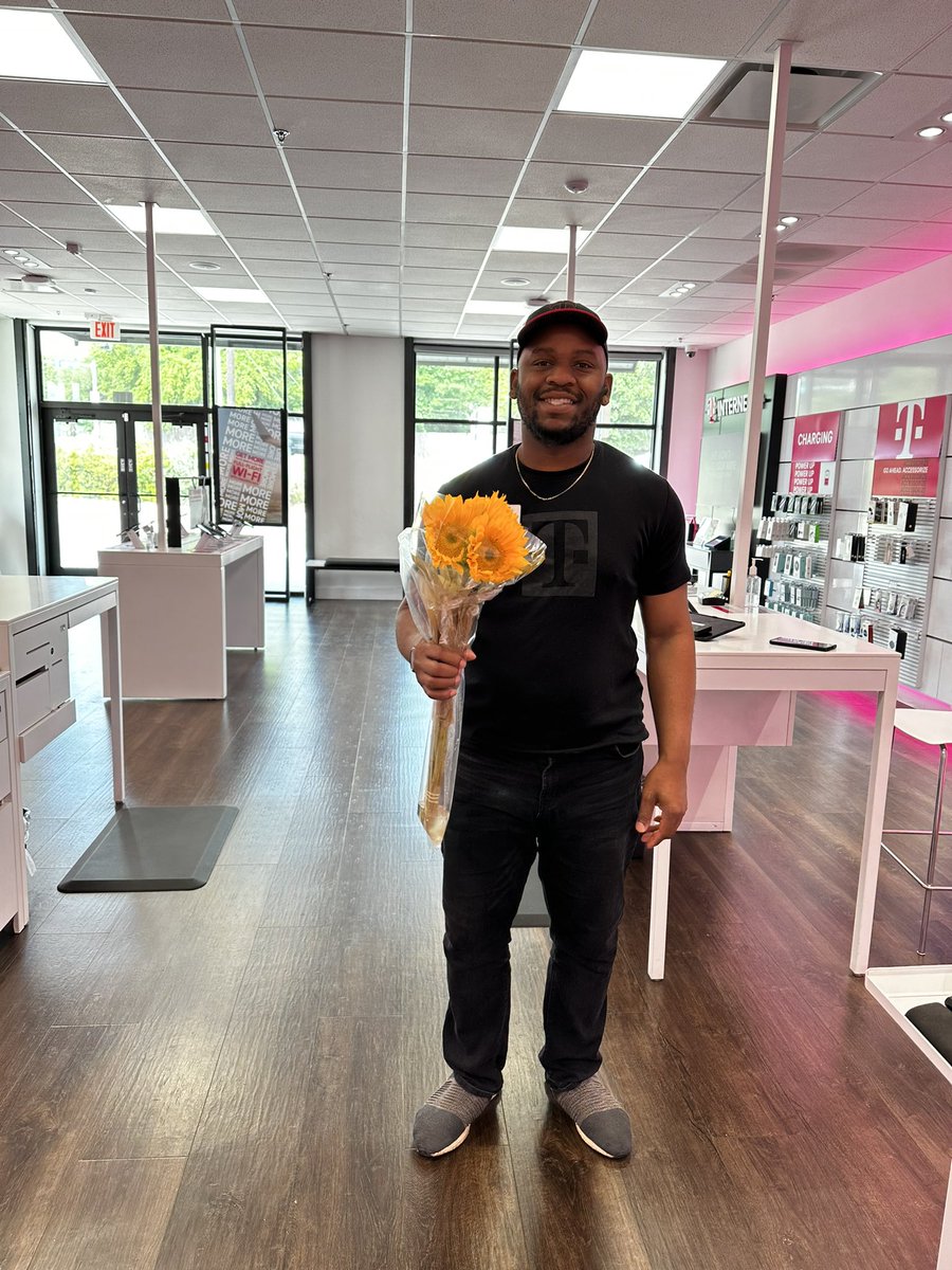 Giving that #uncarrier Customer experience is what separates us from the rest. Thank you Michael for providing this experience daily. 

His customer was so grateful she bought him flowers