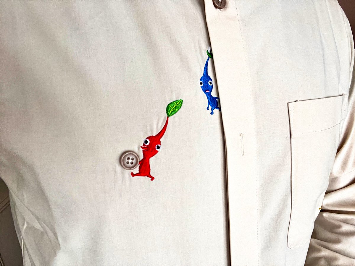 cazwis's tweet photo. This Pikmin shirt I bought has the little guys carrying away one of the buttons and I think thatβs fantastic. https://t.co/LcpgrbP01Y