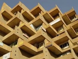 Abdel Moneim Mustafa (1930) is known as “the godfather of modern architecture in Sudan”. As one of the first Sudanese architects, he innovated a climate responsive style rooted in local knowledge systems with numerous iconic works like the El Ikhwa Building (1970) in Khartoum.