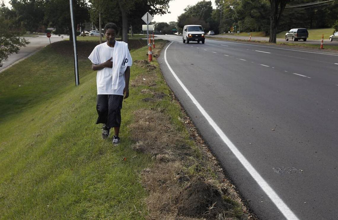 joeywreck's tweet photo. Commuting without a car in the U.S. means walking on roads like this for miles until you reach the next bus stop, while people shout insults out their car window at you. https://t.co/Yv7KG6syeR