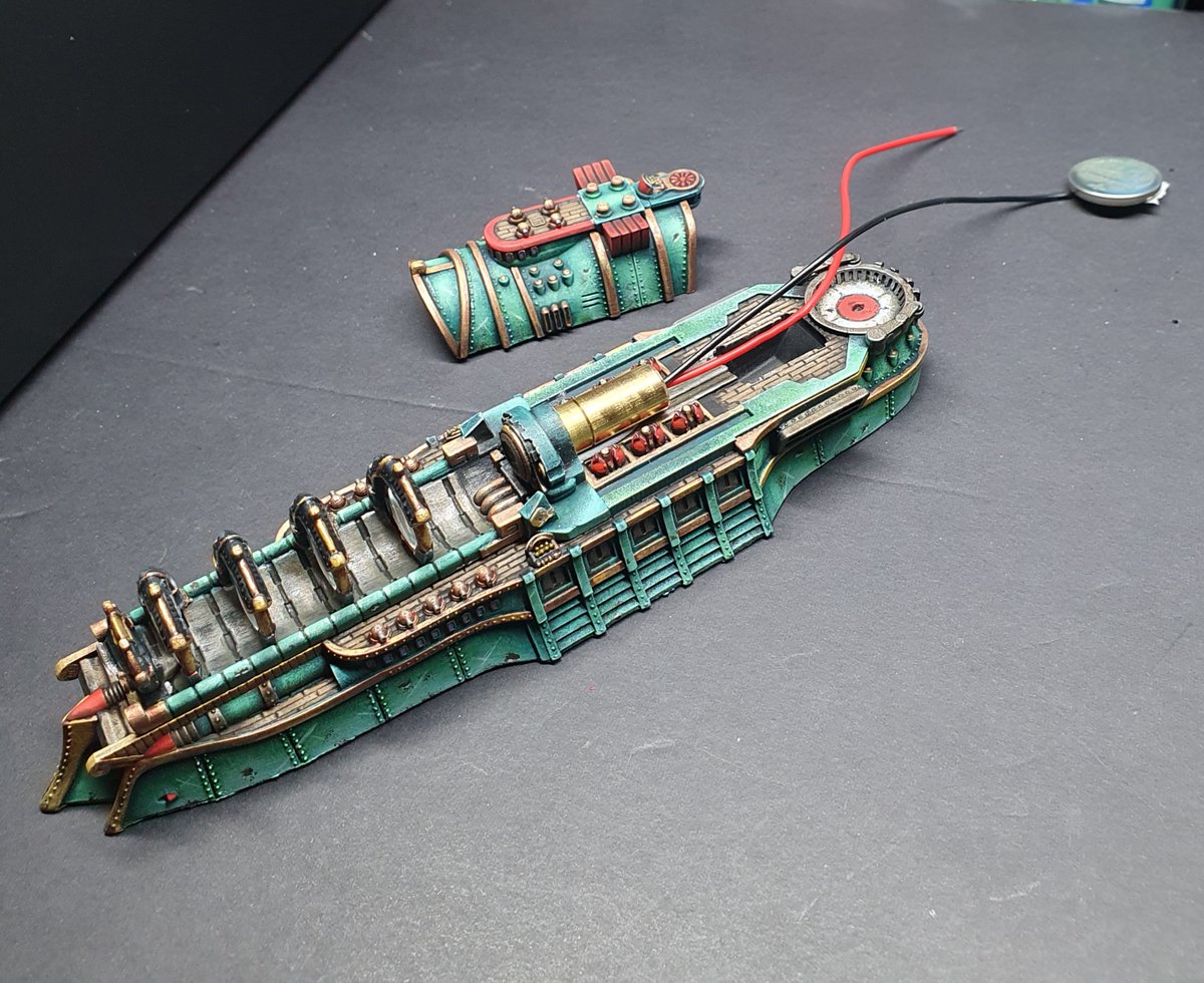 Eyecon74's tweet photo. Dystopian Matsumoto Generator Ship has magnifying lenses, so of course you need to add a laser diode in ! (perfectly safe, the lenses diffuse the laser, some people were concerned it would be melting their ships..)
#miniaturesgaming #steampunk #Dystopianwars #warcradle https://t.co/UzqKdGUl1j