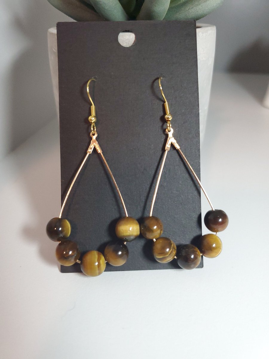 Excited to share the latest addition to my #etsy shop: Tiger's Eye Beaded Teardrop Earrings etsy.me/3mZDo7p #brown #teardrop #tigerseye #unisexadults #teardropearrings #tigerseyeearrings #beadedearrings #love2jewelry #cliponearrings #love2jewelry