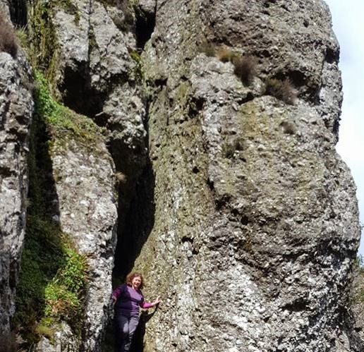 Johngodwyer1's tweet photo. Pictured at Crotty's Cave in the #Comeragh Mountains is Brid Ryan Bourke of Mid-Tipp Walkers. The cave was the hideout of highwayman &amp; local hero William Crotty, who reputedly robbed rich settlers to help the poor. Hanged in Waterford in 1752, his gold still awaits a lucky finder https://t.co/Dzj21xTbK1
