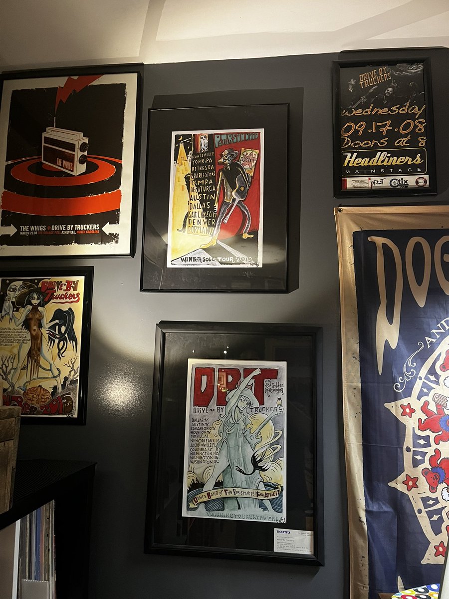 steveholt70's tweet photo. @pattersonhood Looking forward to the Rock Show tomorrow night, and so damn glad y’all came back to Columbia! Hope y’all enjoy your time here and keep us in the rotation. Here’s my DBT wall. Seen more shows than I have posters for, and will add one more tomorrow night! 😃🤘🏻 https://t.co/m4wVVDLoiq