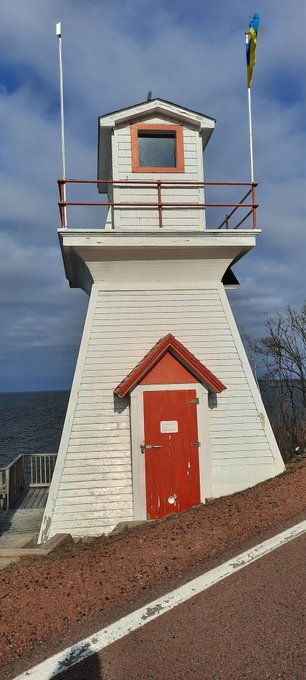 Cute lil' lighthouse near Wallace, NS 🛟  ft. my peach 🍑🤭  ps isnt the red road cool ?? . . . &bull; booty<a href="/tag/tittytuesday"class="tags"><span>#tittytuesday</span></a>