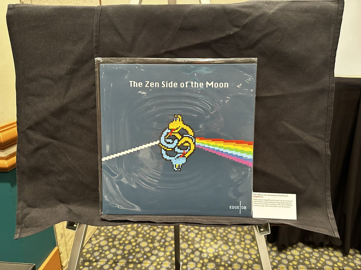 pyladies's tweet photo. @llanga introducing the one of a kind “The Zen Side of the Moon” vinyl record including works from core #Pytjob devs @roguelynn @ewa_jodlowska and more! #PyLadiesAuction @pcpn #PyCon2023 #PyConUS2023 https://t.co/YQ4dwovOqi
