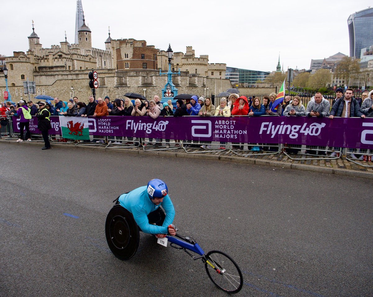 East15Films's tweet photo. First few of the wheelchair users speeding around the bend at Tower of London wheelchair. 

 #LondonMarathon  @bbcnews @skynews
#weruntogether https://t.co/IjJbF7Mh2W