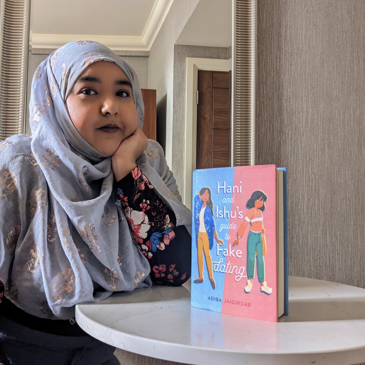 adiba_j's tweet photo. The Hani &amp; Ishu's Guide to Fake Dating readalong starts today!

I'm so excited to dive back in after so long! Ofc I have all formats of the book so I'll be dipping into audio, digital &amp; physical! 

If you're participating, which format are you reading?

 #haniandishureadalong https://t.co/CWvBTCWsOV